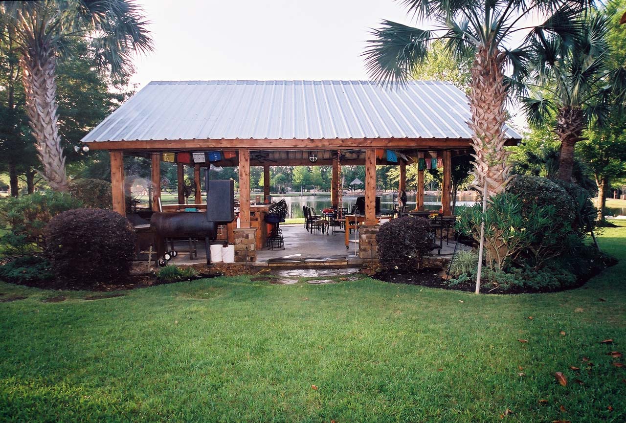 Castle Estate — waterfront pavilion with palm trees